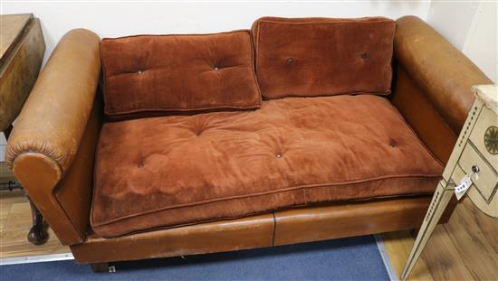 An early 20th century French tan leather and fabric day bed W.155cm